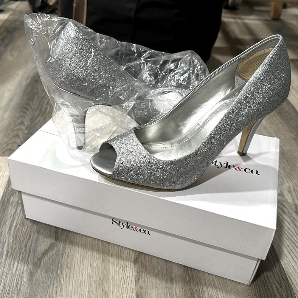 Sparkly silver heals never worn.